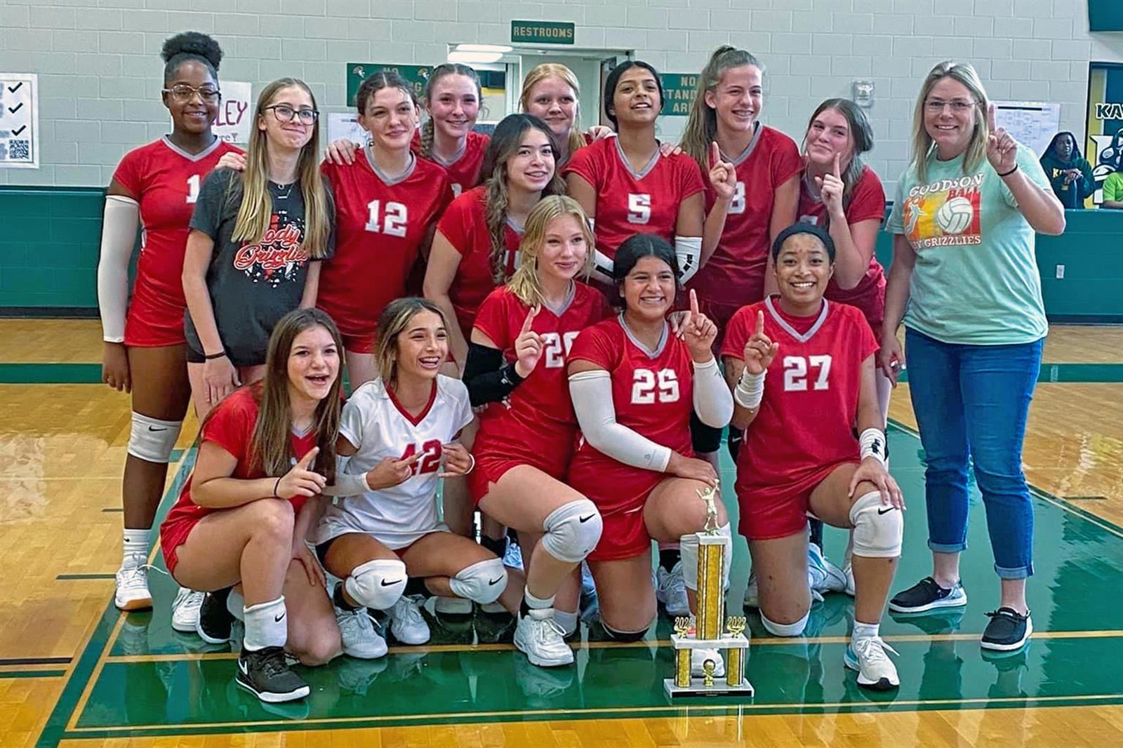 The Goodson eighth grade volleyball B team poses after winning the CFISD Middle School “B” Volleyball Tournament.